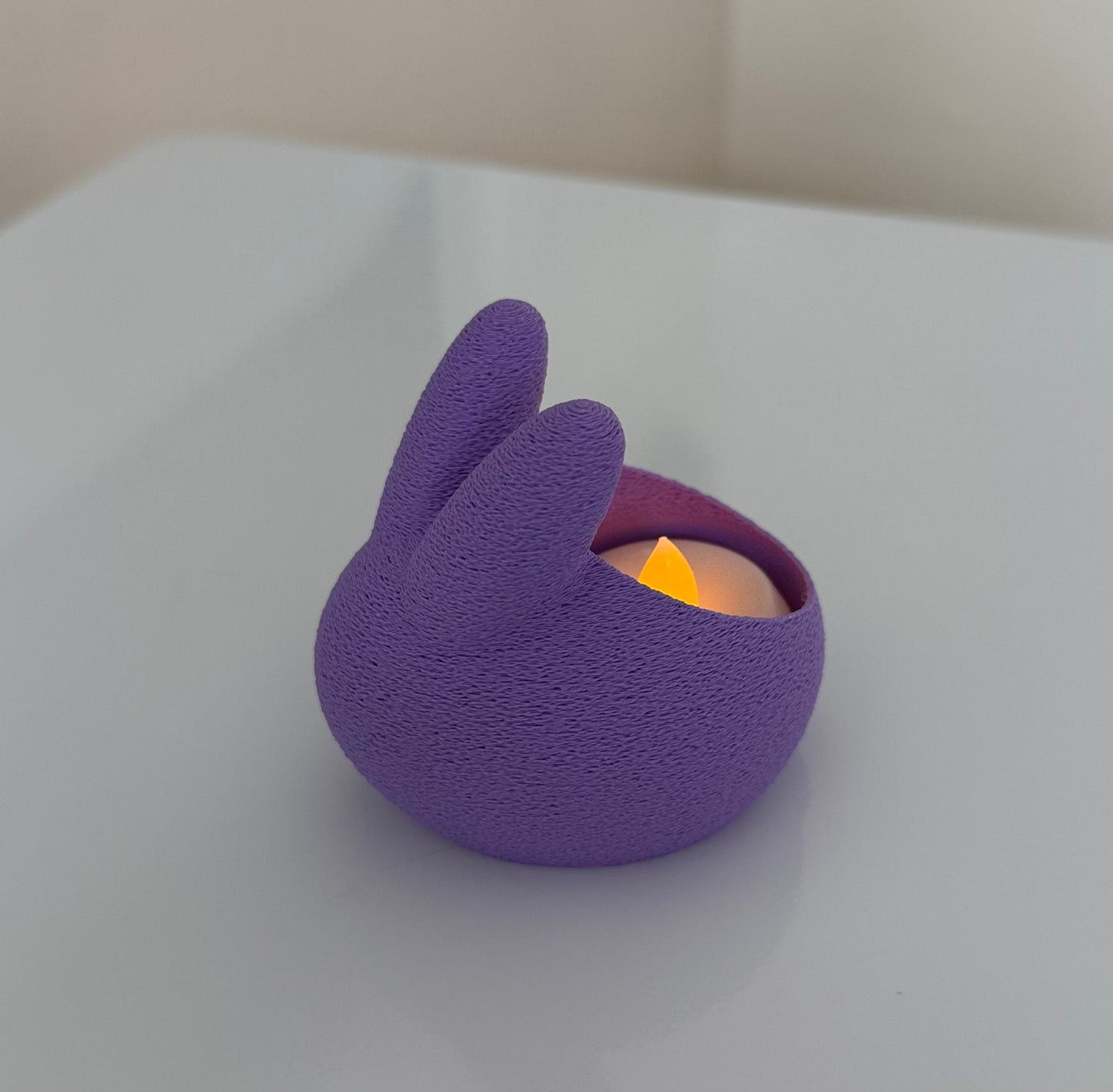 Portavelas en forma de conejo